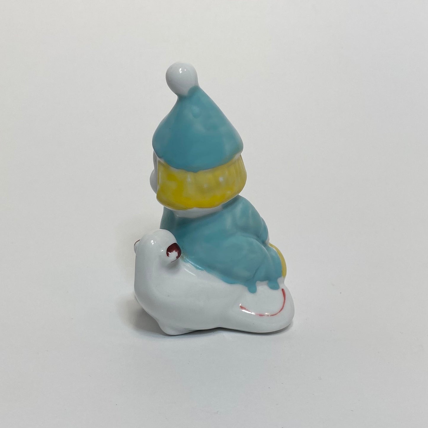 Ceramic Clown on Airplane Figurine