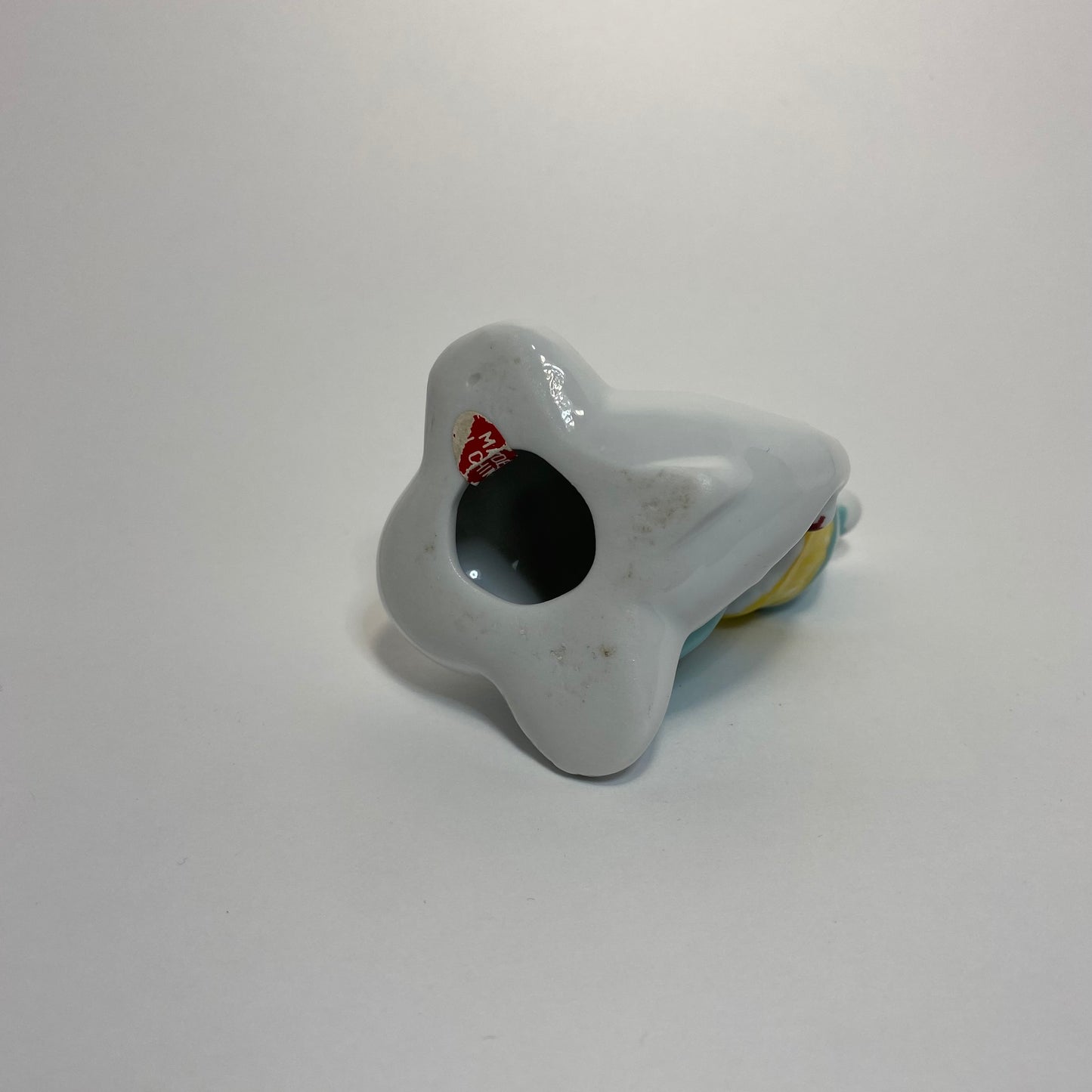 Ceramic Clown on Airplane Figurine