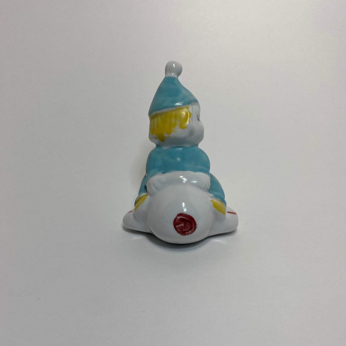 Ceramic Clown on Airplane Figurine