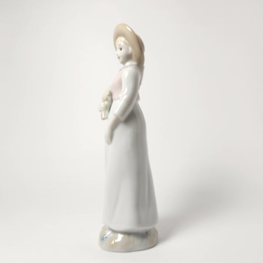 Prestige Collector - Porcelain Girl with Flowers and Hat 1990
