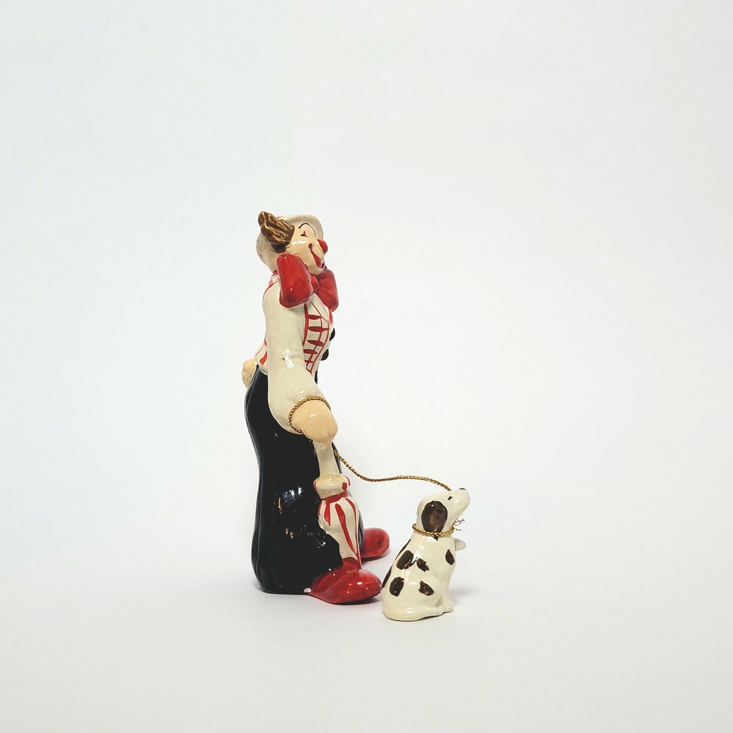 Enesco - Porcelain Clown with Dog on Leash Figurine