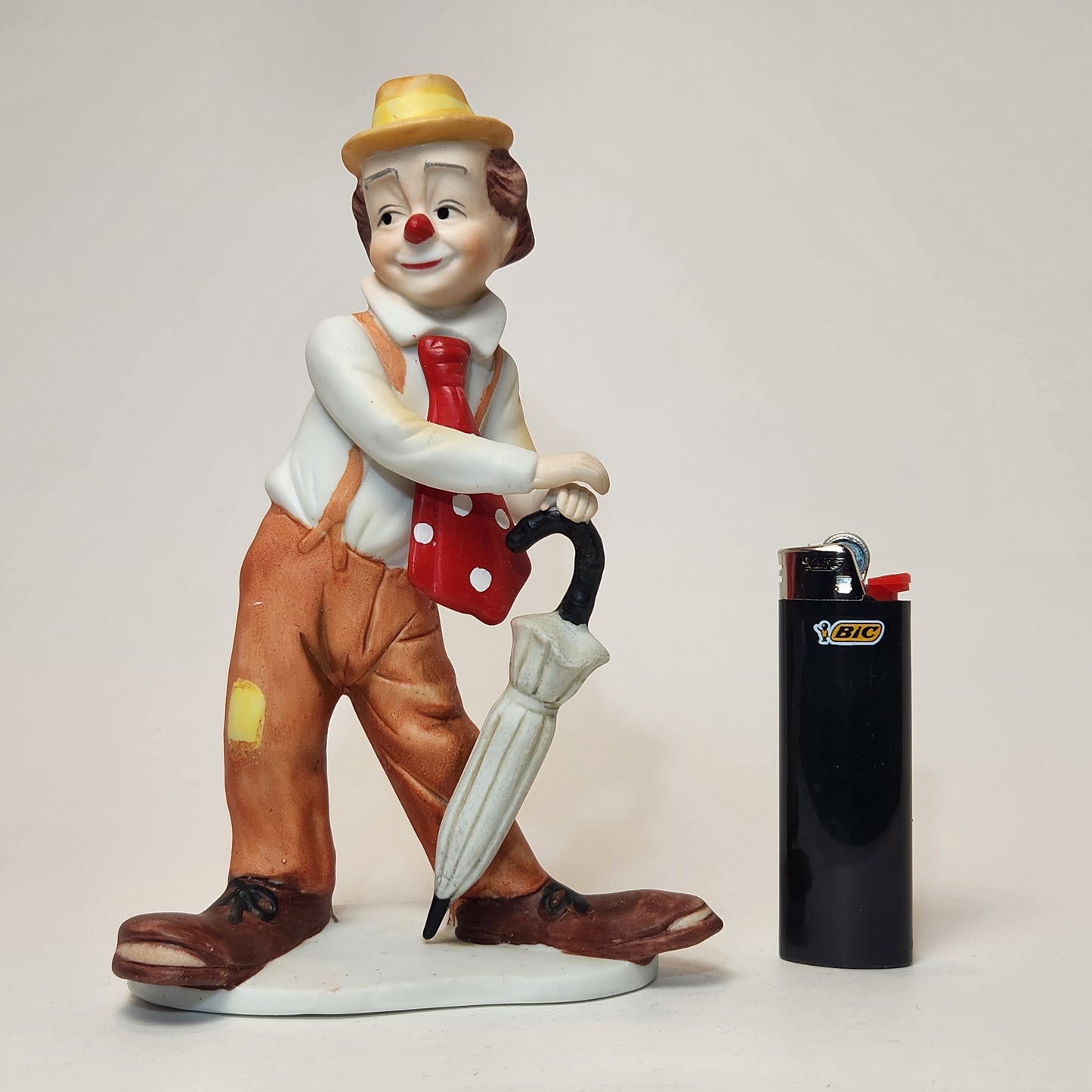 Arnart Imports - Porcelain Clown with Umbrella 1982