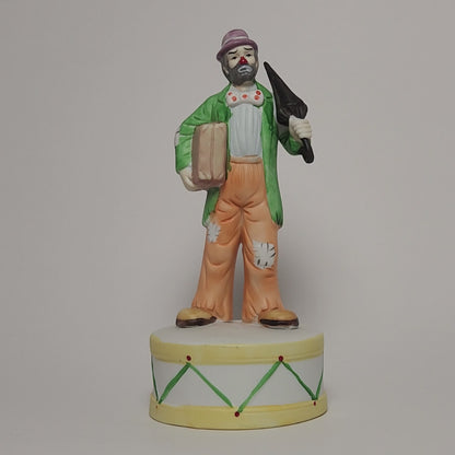 Flambro - Emmett Kelly Jr. - Hobo Clown with Umbrella Porcelain Bisque Music Box 1984