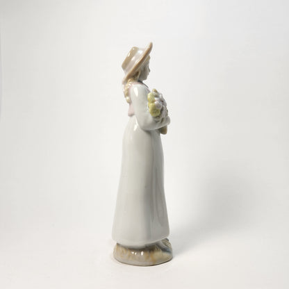 Prestige Collector - Porcelain Girl with Flowers and Hat 1990