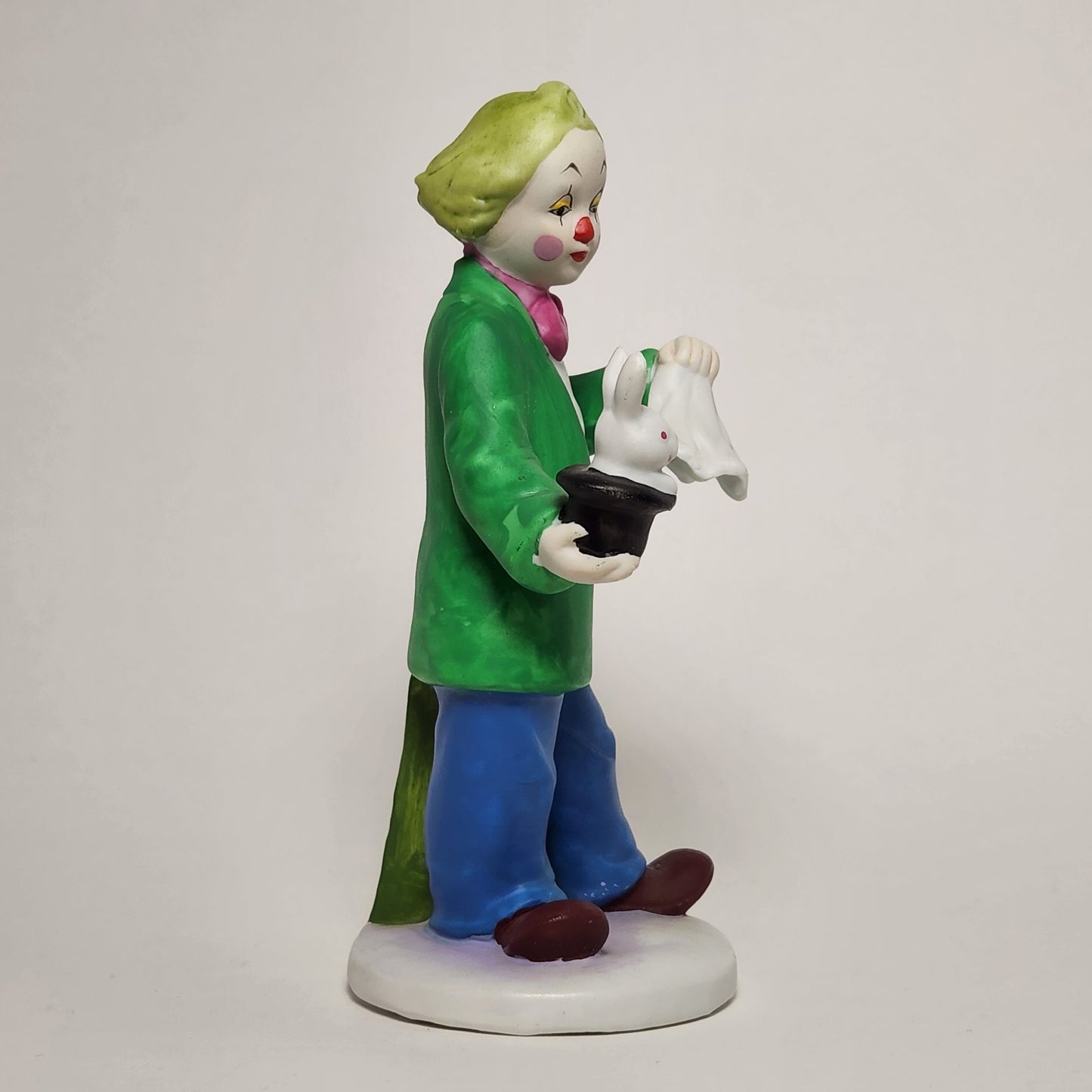 Porcelain Clown with Rabbit in a Hat Figurine
