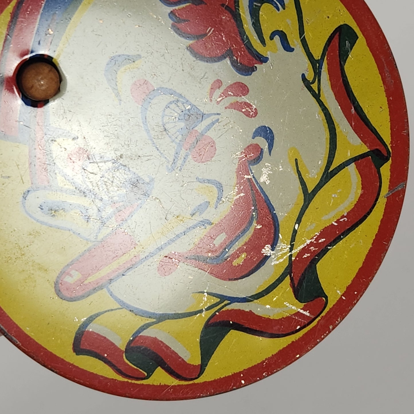 Kirchhof - Tin Lithographed Clown Face Noisemaker Toy with Wooden Handle