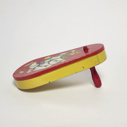 Tin Lithographed Dancing Clown Noisemaker Toy with Wooden Handle