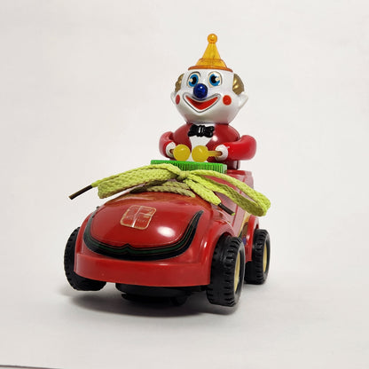 Motorized Light-Up Clown in Car Toy