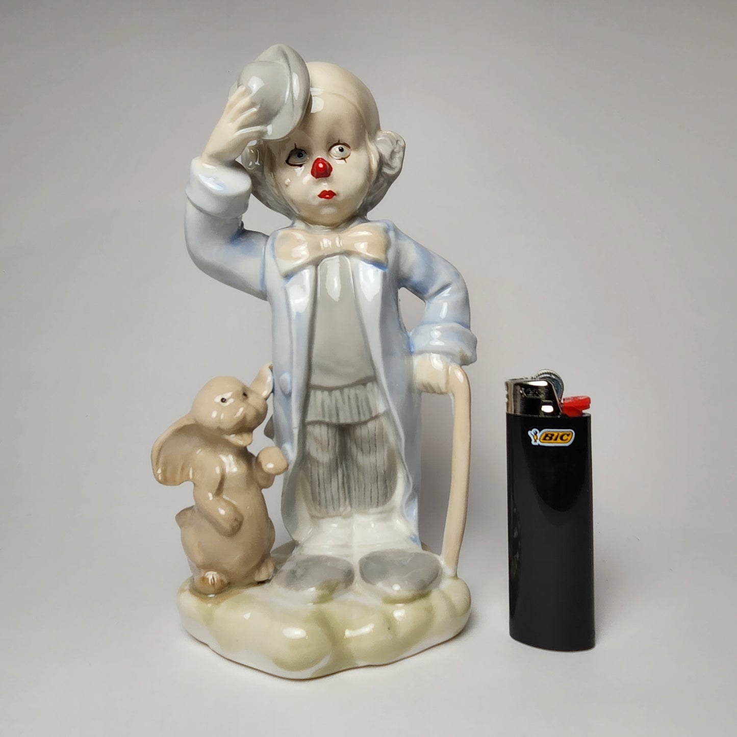 Price Products - Porcelain Clown with Cane & Dog Figurine