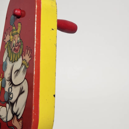 Tin Lithographed Dancing Clown Noisemaker Toy with Wooden Handle