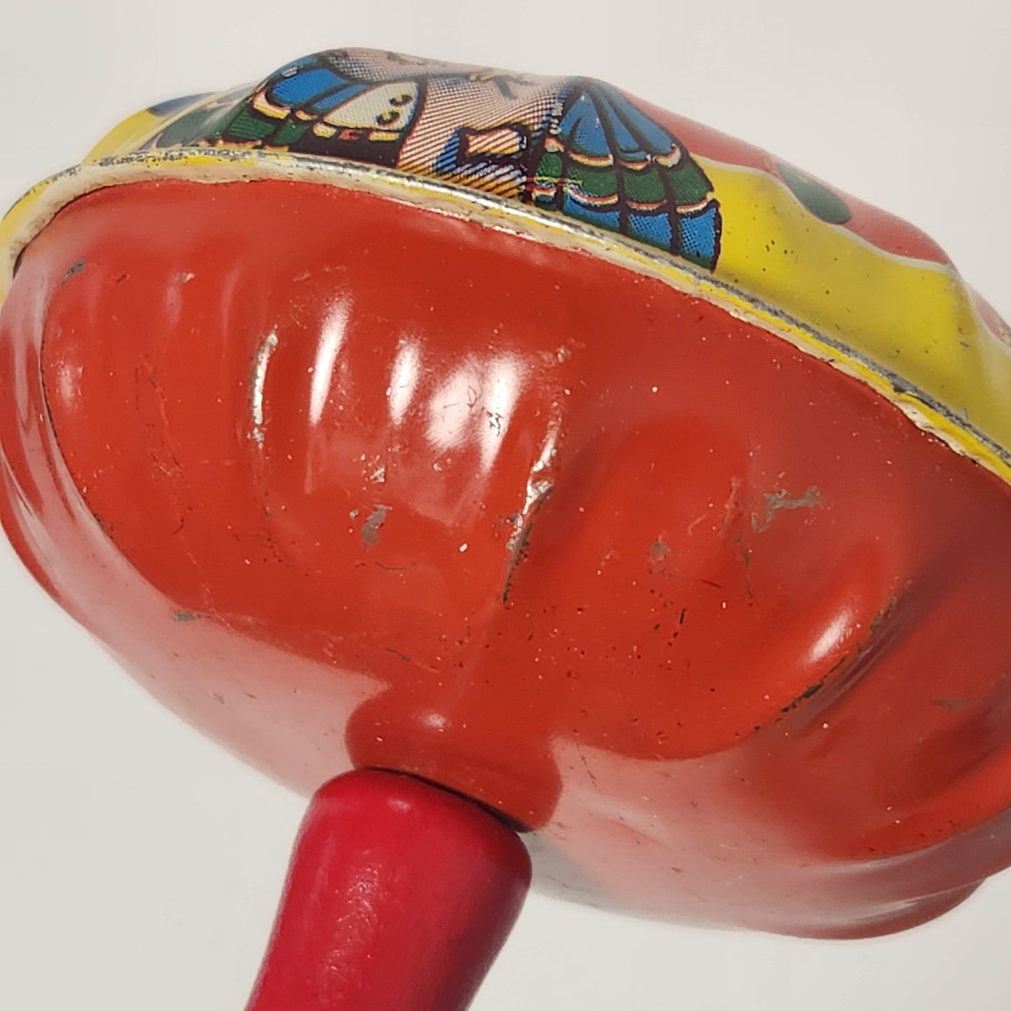 Tin Lithographed New Year's Eve Noisemaker Toy with Wooden Handle