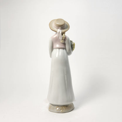 Prestige Collector - Porcelain Girl with Flowers and Hat 1990