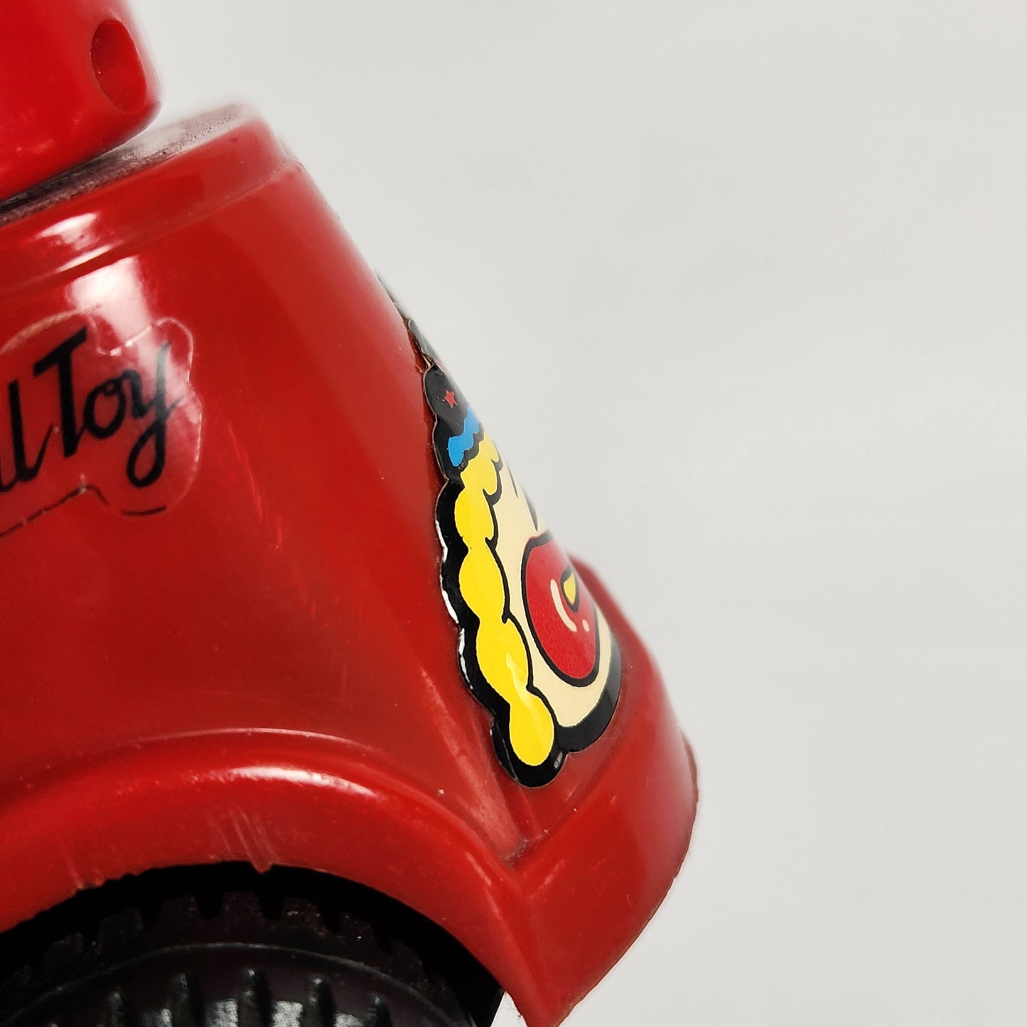 Motorized Light-Up Clown in Car Toy