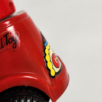 Motorized Light-Up Clown in Car Toy