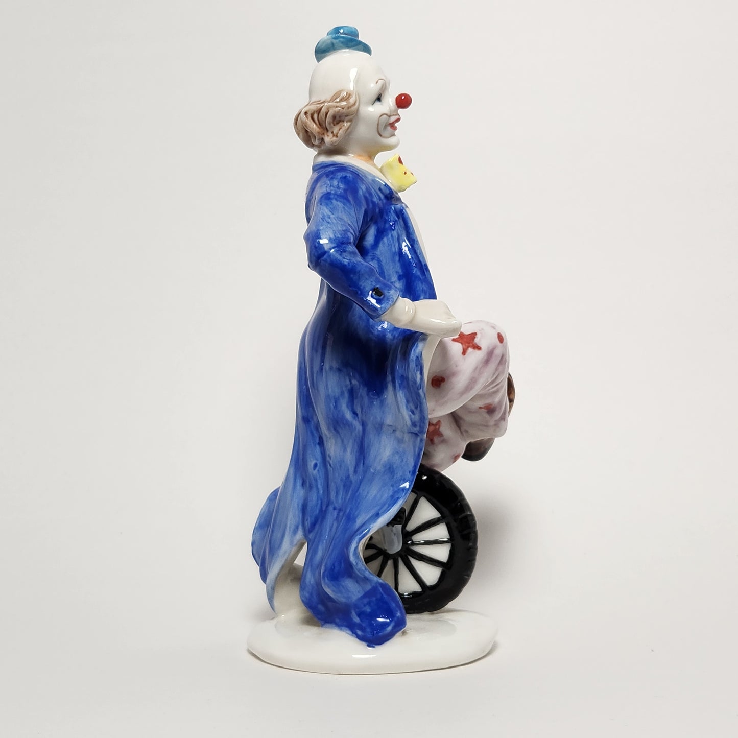 Ceramic Clown on Unicycle Figurine