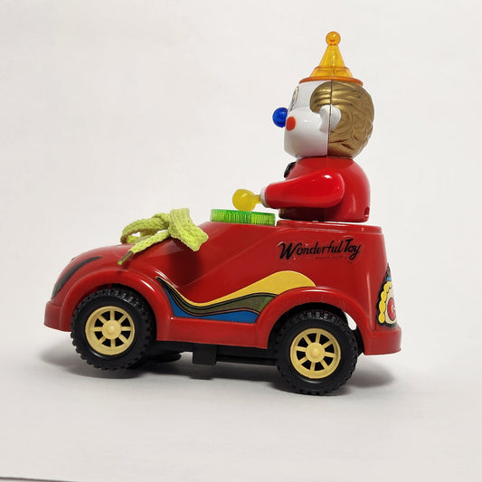 Motorized Light-Up Clown in Car Toy