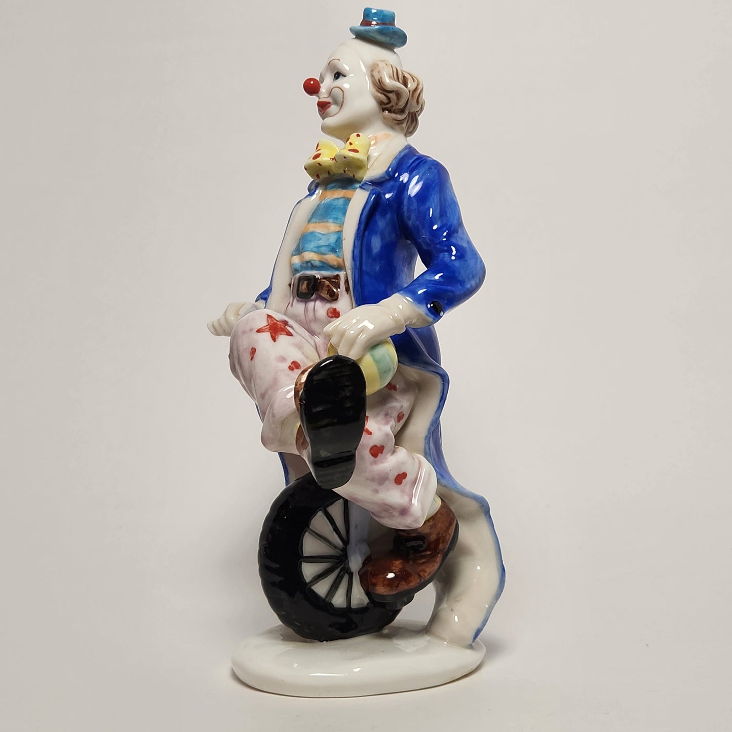 Ceramic Clown on Unicycle Figurine