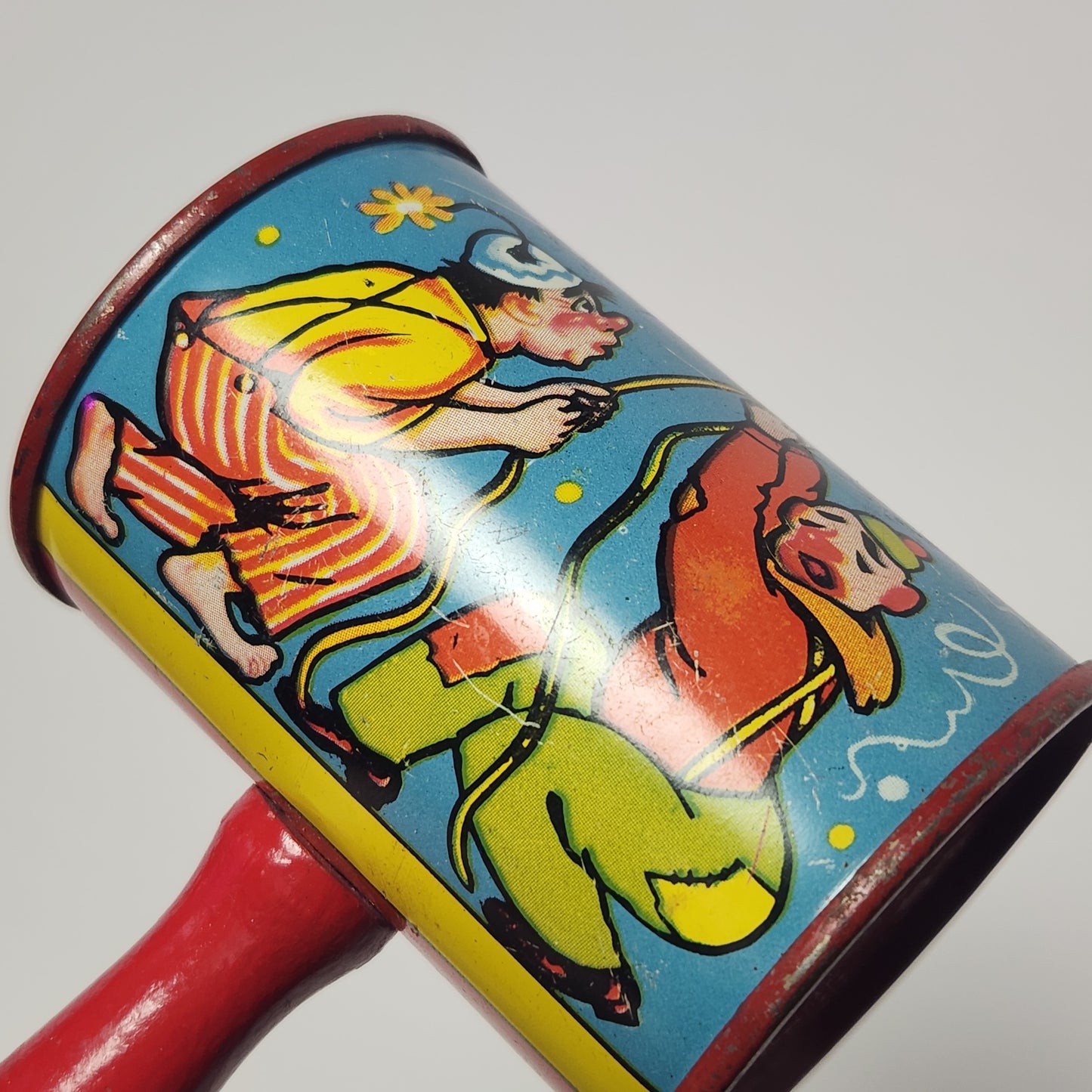 Tin Lithographed Clowns with Duck and Dog Noisemaker Toy with Wooden Handle