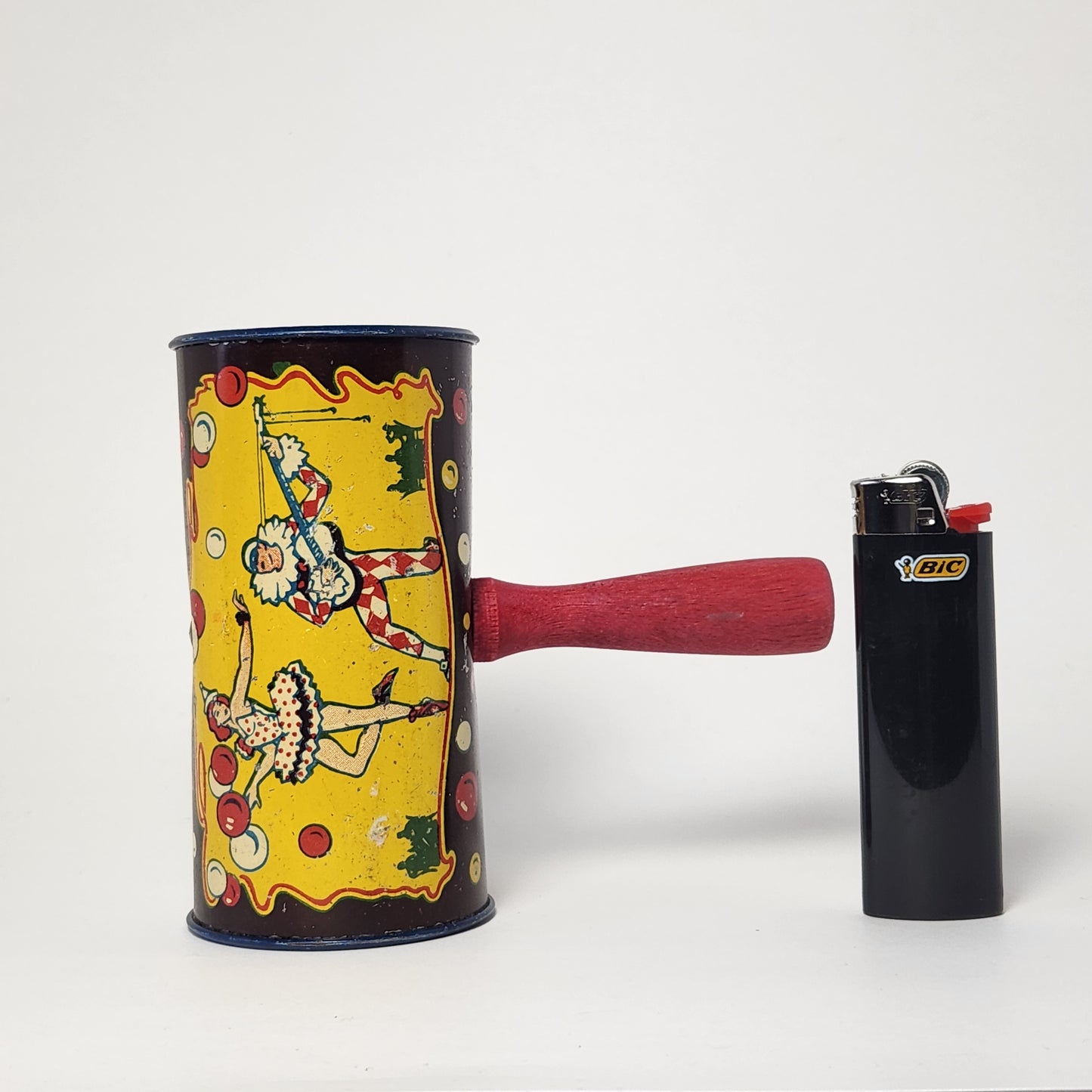 Kirchhof - Tin Lithographed Clown Noisemaker Toy with Wooden Handle (Yellow)