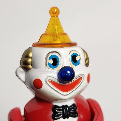 Motorized Light-Up Clown in Car Toy