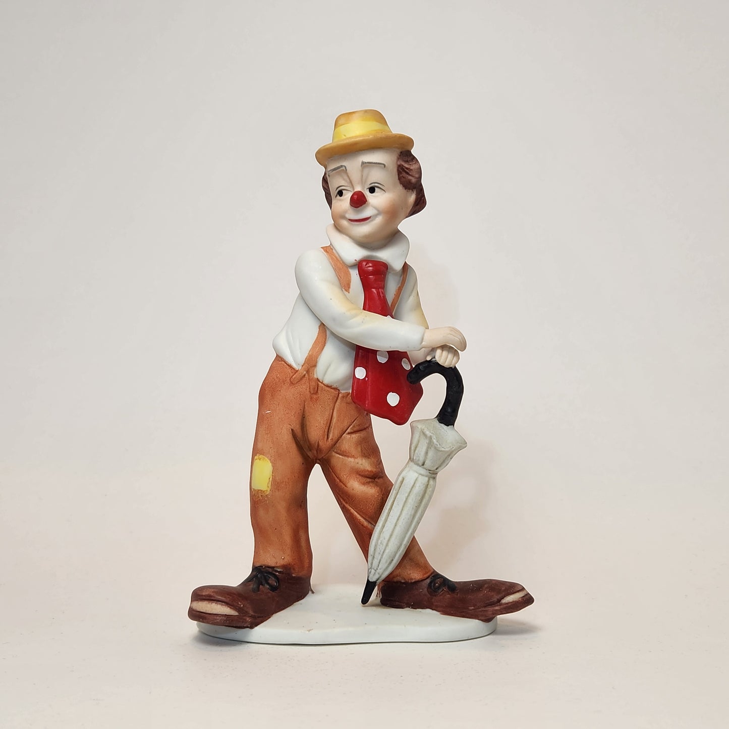 Arnart Imports - Porcelain Clown with Umbrella 1982