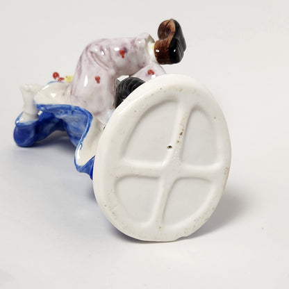 Ceramic Clown on Unicycle Figurine