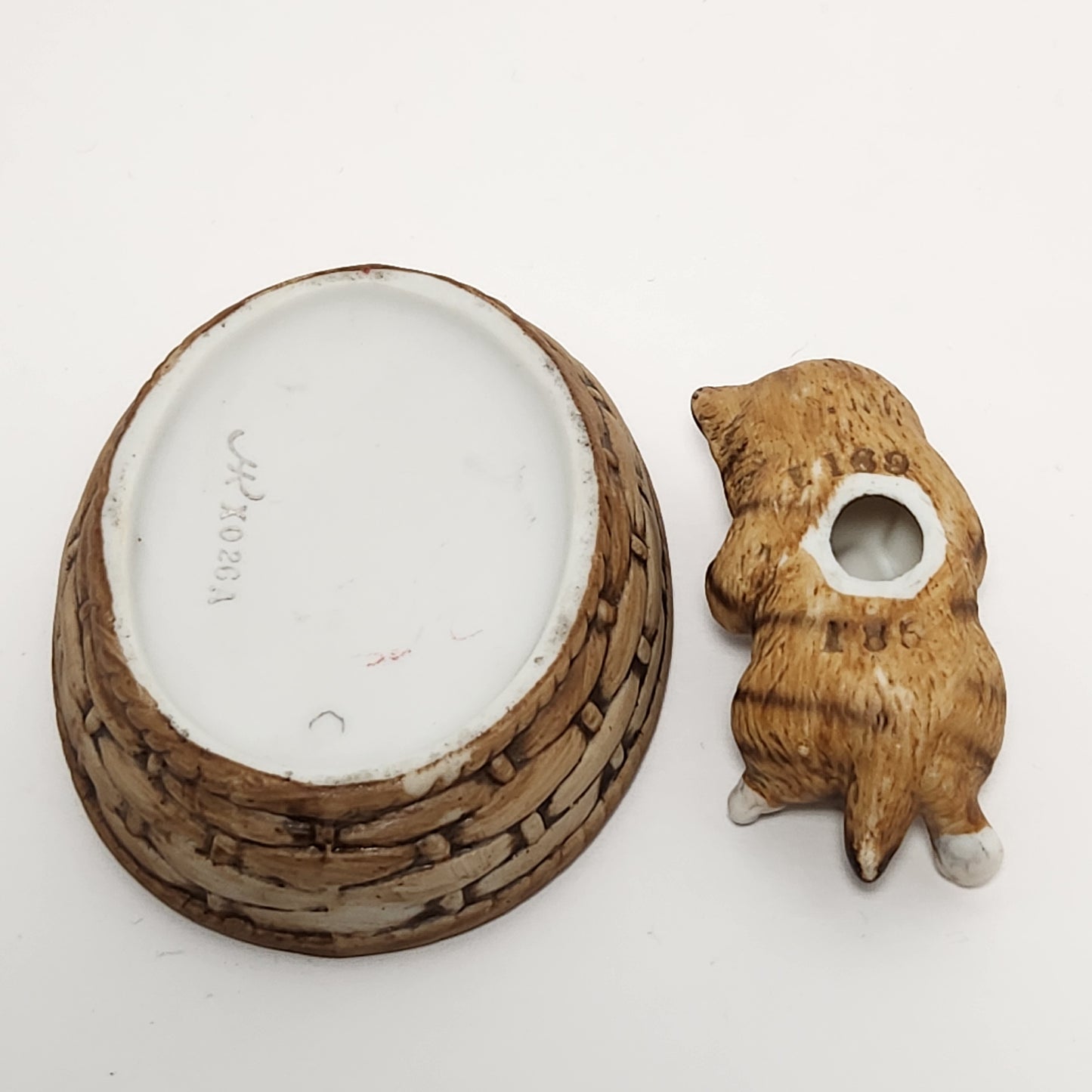 House of Global Art - Harvey Knox Kingdom - Sleeping Kitten in Basket Porcelain Figurine