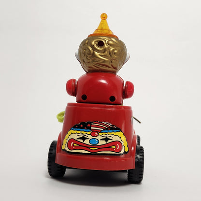 Motorized Light-Up Clown in Car Toy