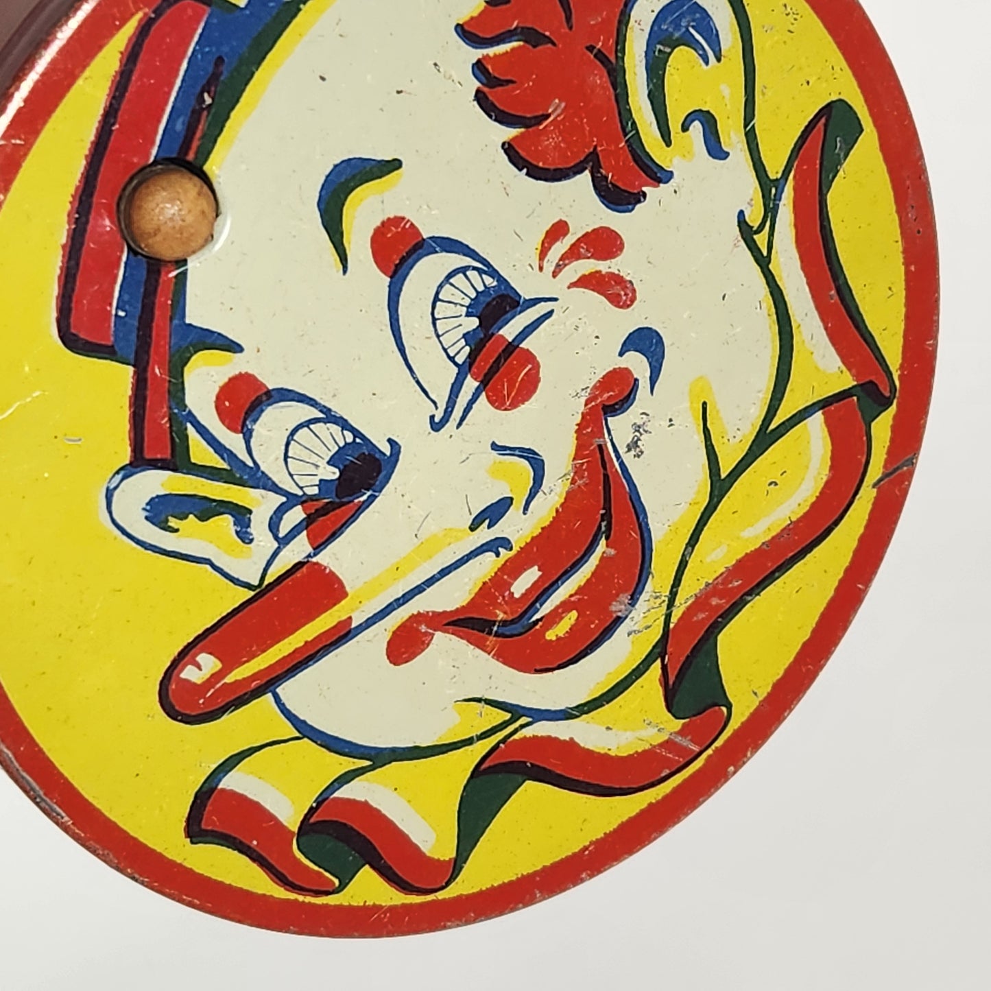 Kirchhof - Tin Lithographed Clown Face Noisemaker Toy with Wooden Handle