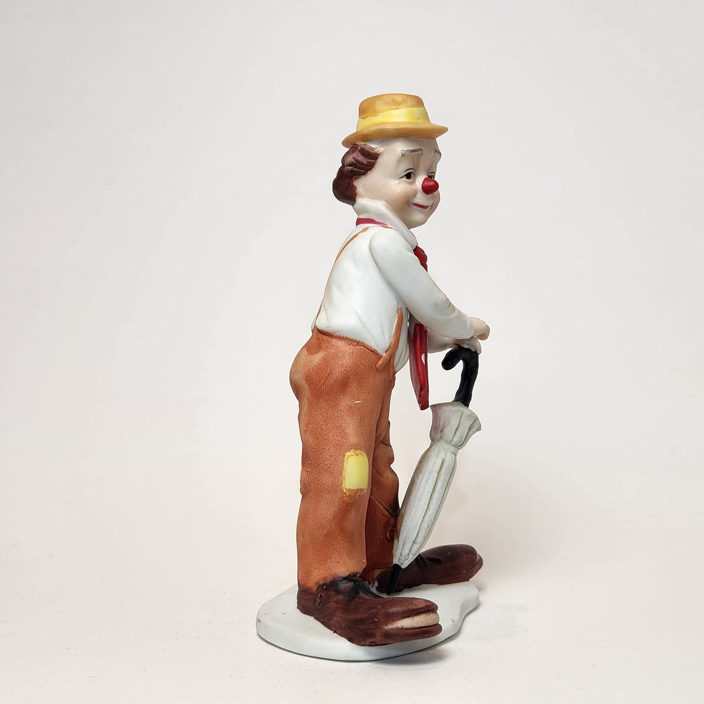 Arnart Imports - Porcelain Clown with Umbrella 1982